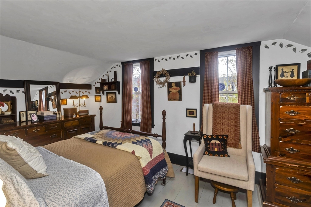 20 Auburn Street Chicopee, MA 01013 - Photo 23 of 36 a bedroom with a bed and a couch