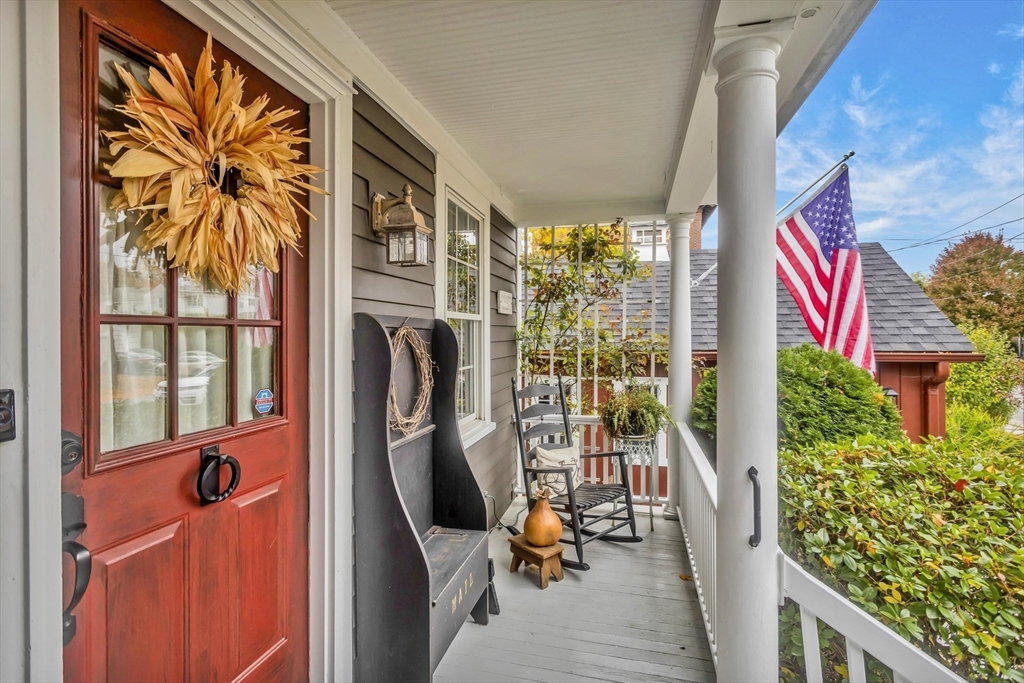 20 Auburn Street Chicopee, MA 01013 - Photo 4 of 36 a view of a balcony with furniture and floor to ceiling window
