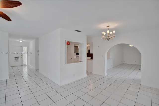 a view of an empty room with window