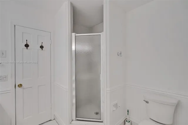 a bathroom with a sink double vanity and a mirror