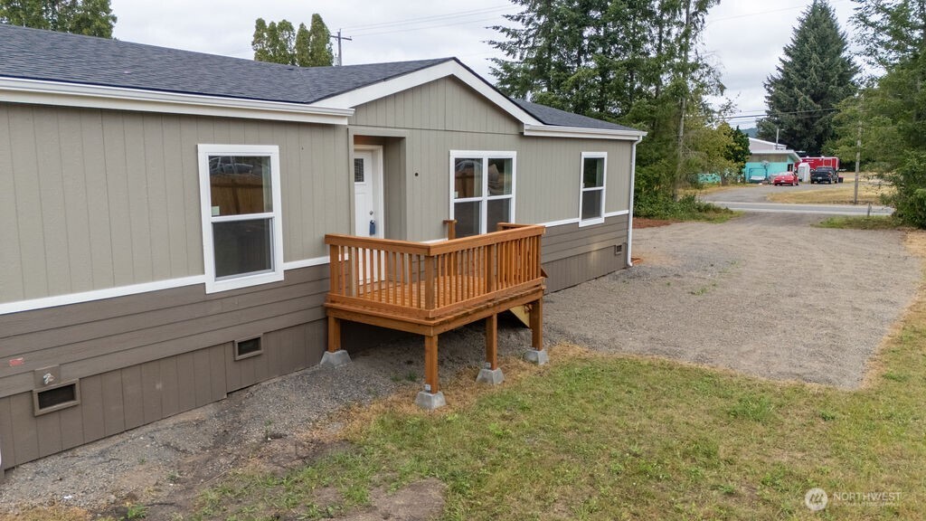 1450 Calawah Way Forks, WA 98331 - Photo 2 of 38 a view of backyard with deck and seating area
