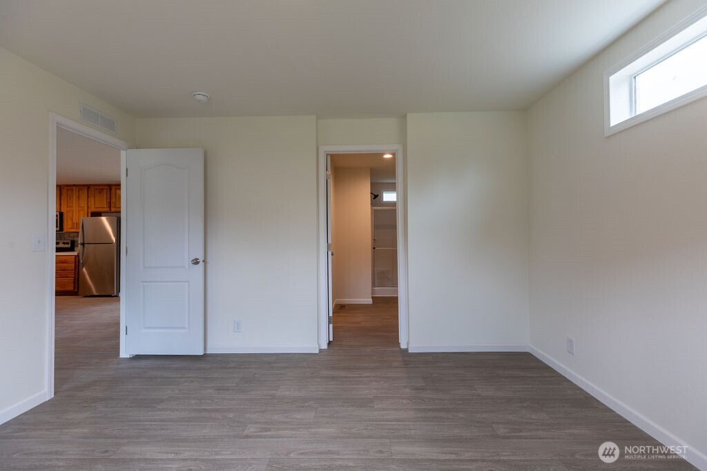 1450 Calawah Way Forks, WA 98331 - Photo 23 of 38 a view of hallway with wooden floor