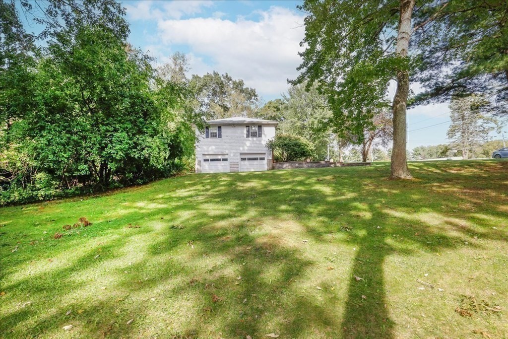 1 Donald Circle Andover, MA 01810 - Photo 28 of 42 a view of a big yard with large trees