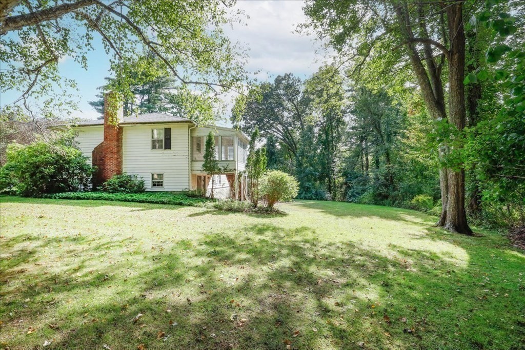 1 Donald Circle Andover, MA 01810 - Photo 29 of 42 a view of a house with backyard and tree