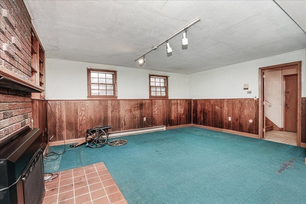 1 Donald Circle Andover, MA 01810 - Photo 32 of 42 a view of a room with wooden walls
