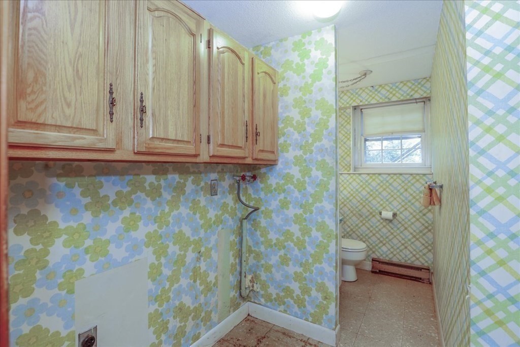 1 Donald Circle Andover, MA 01810 - Photo 37 of 42 a view of a bathroom with a shower curtain