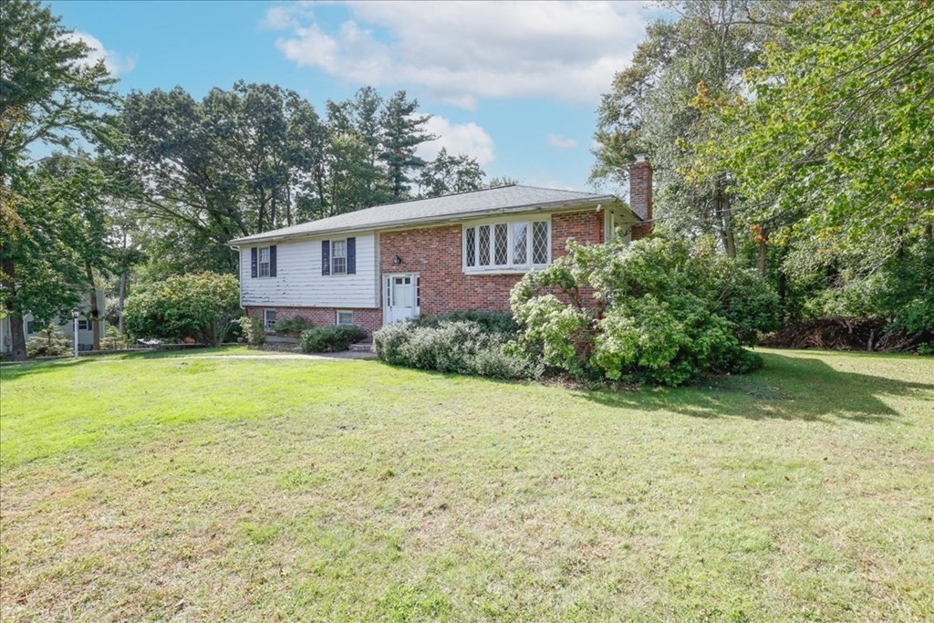 1 Donald Circle Andover, MA 01810 - Photo 42 of 42 a front view of a house with a yard