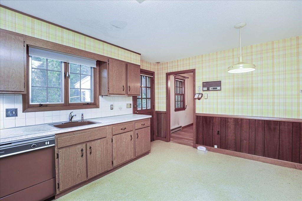 1 Donald Circle Andover, MA 01810 - Photo 8 of 42 a kitchen with sink and cabinets