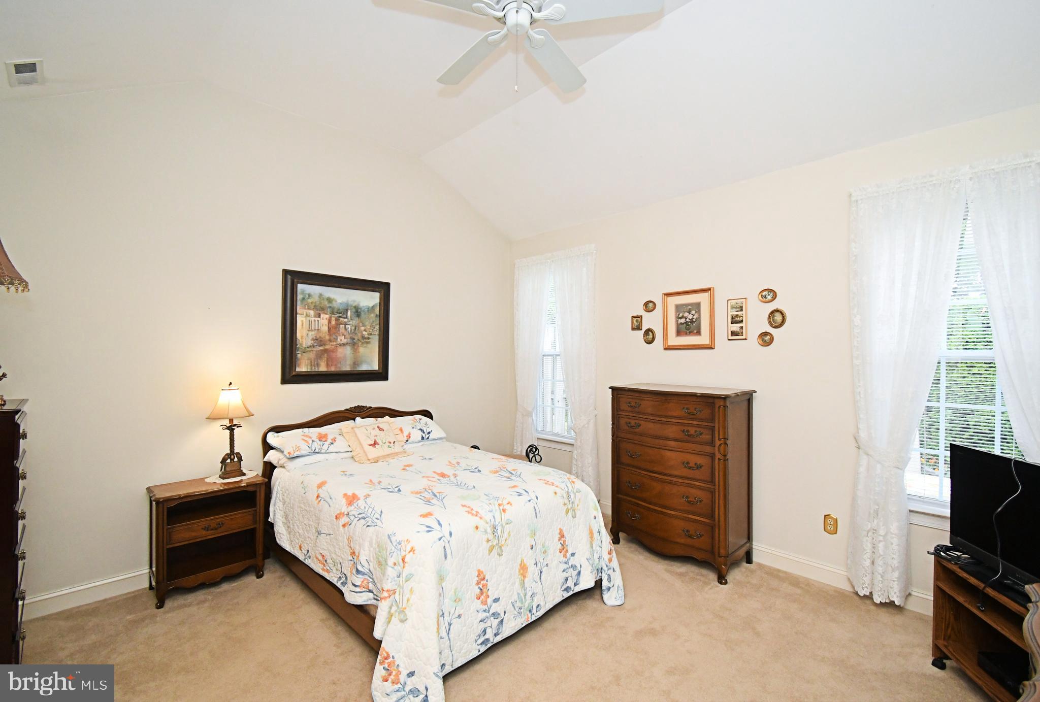 2 Newbury Way Lansdale, PA 19446 - Photo 15 of 29 a bedroom with a bed and a chandelier