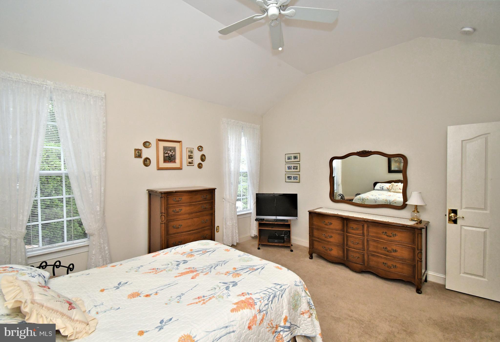 2 Newbury Way Lansdale, PA 19446 - Photo 16 of 29 a bedroom with a bed and a dresser