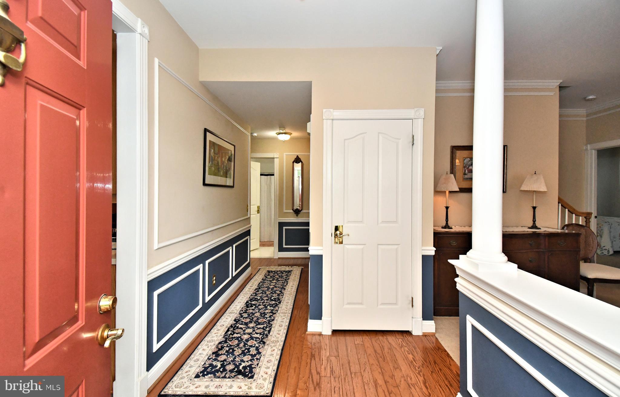 2 Newbury Way Lansdale, PA 19446 - Photo 4 of 29 a view of a hallway with wooden floor and staircase