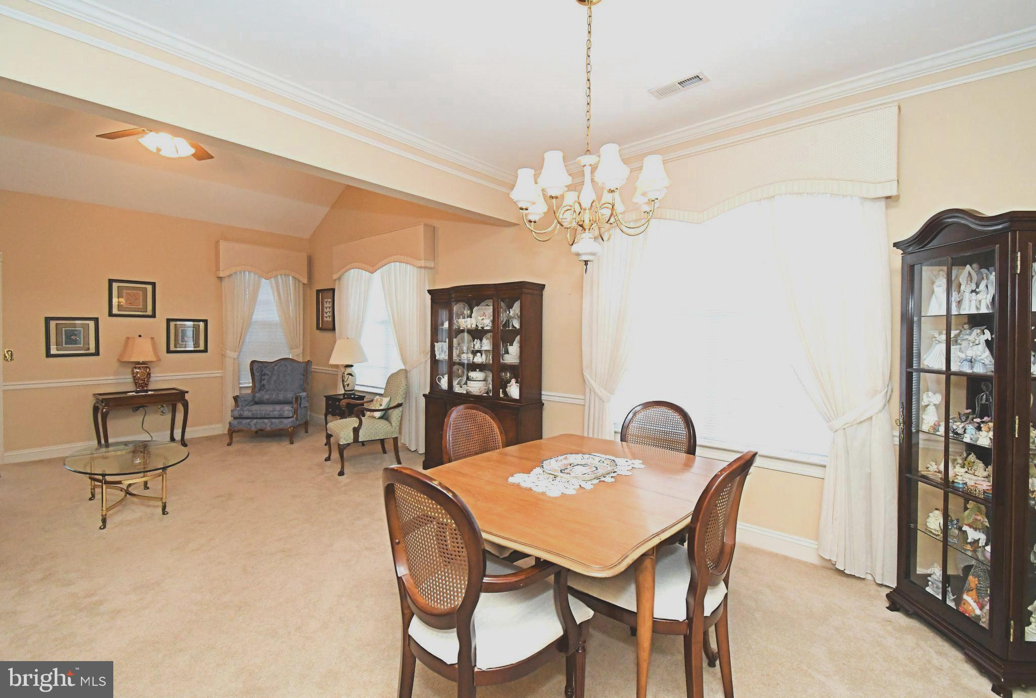 2 Newbury Way Lansdale, PA 19446 - Photo 5 of 29 a view of a dining room with furniture and a chandelier