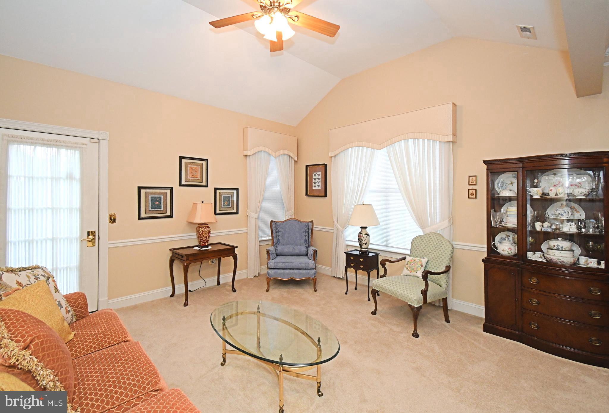 2 Newbury Way Lansdale, PA 19446 - Photo 7 of 29 a living room with furniture chandelier and a large window