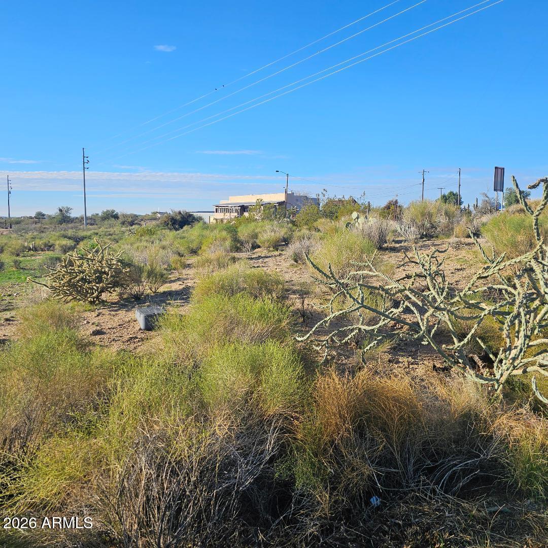 22290 Gayle Court, Unit 61 Congress, AZ 85332 - Photo 7 of 10 a view of a building with mountains in the background