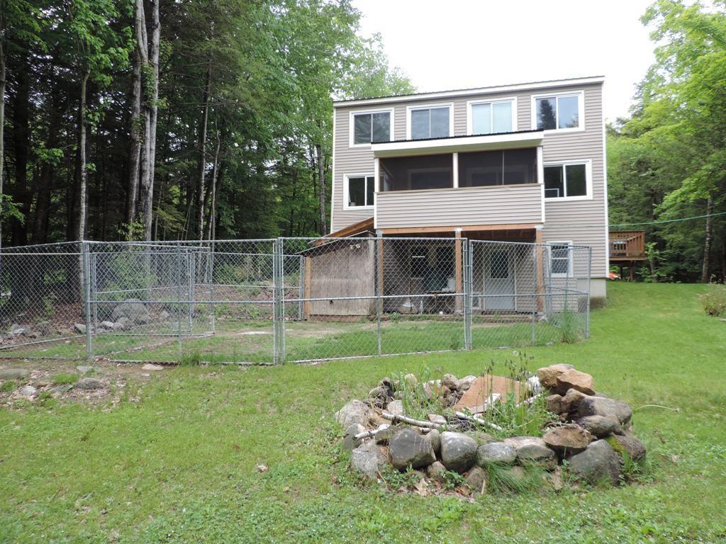 90 Cape Monday Road Harrison, ME 04040 - Photo 1 of 22 Contemporary Chalet with pet fencing...
