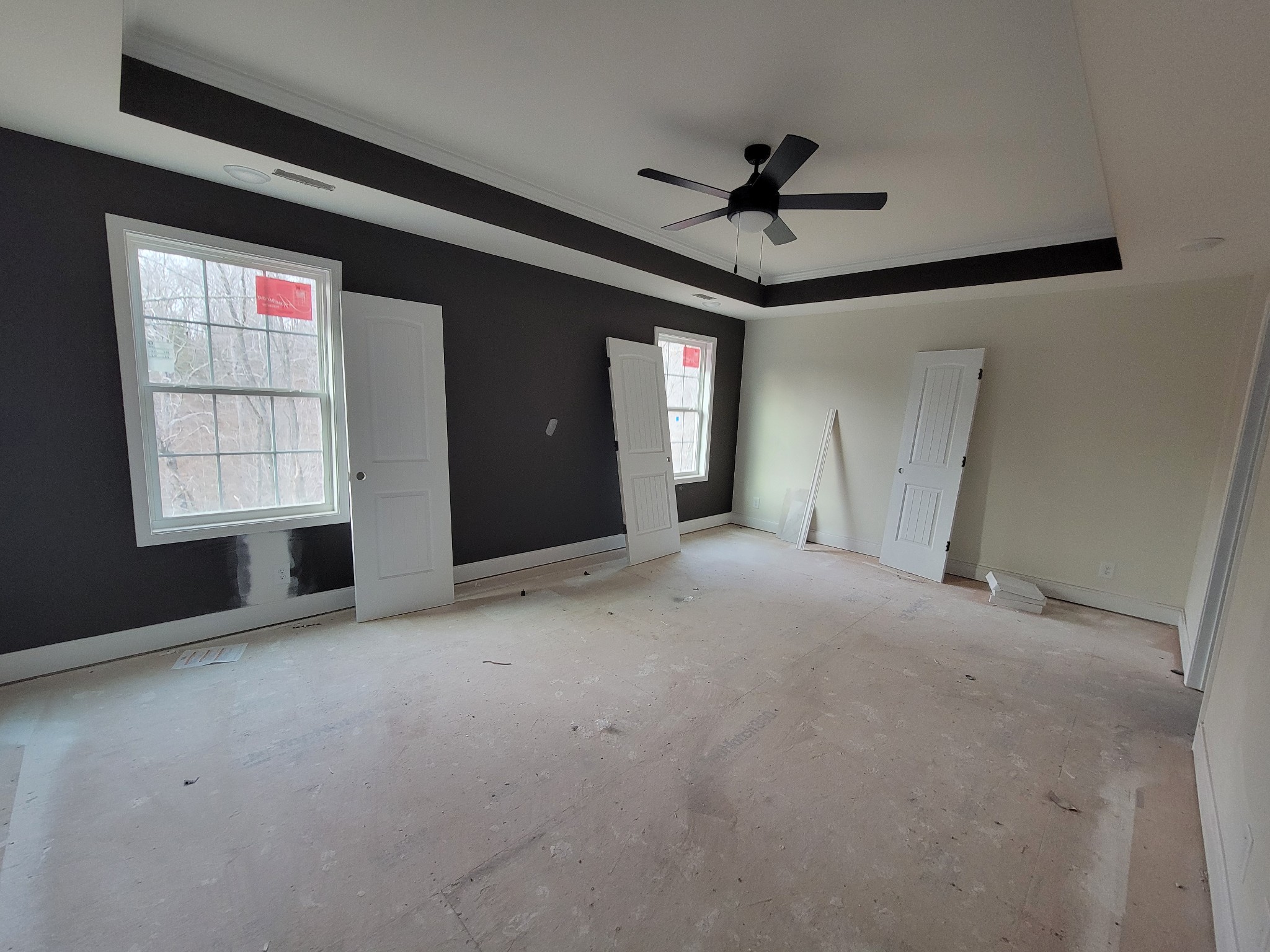 2285 Mockingbird Hill Road Palmyra, TN 37142 - Photo 7 of 19 a view of a livingroom with a ceiling fan and window
