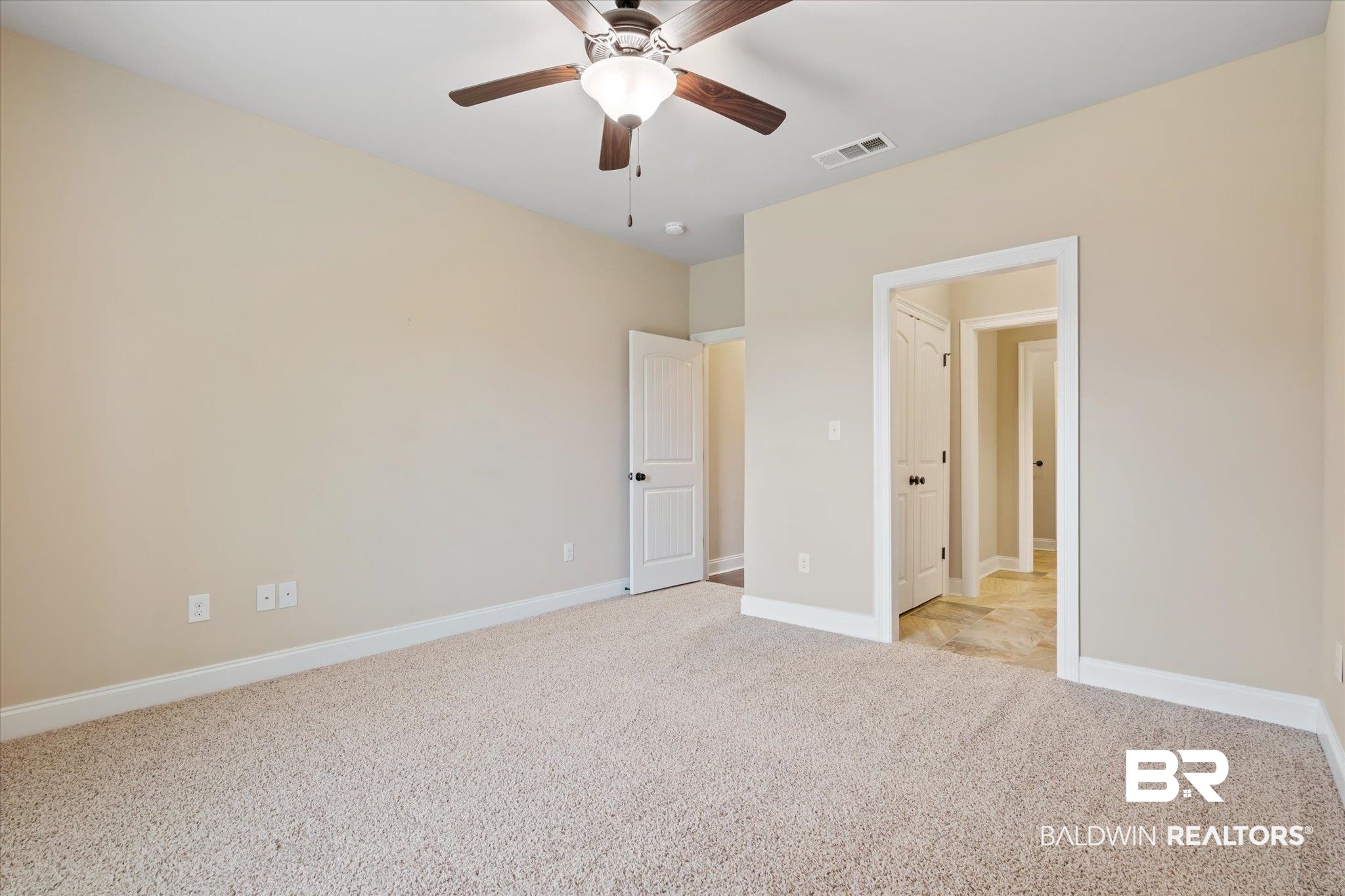 423 Breckin Drive Fairhope, AL 36532 - Photo 22 of 31 Unfurnished bedroom featuring light colored carpet and ceiling fan