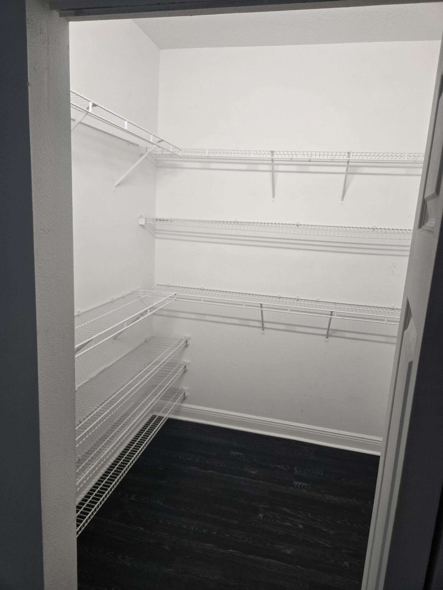 2472 Southwest Valnera Street Port St. Lucie, FL 34953 - Photo 17 of 30 His & Her closet