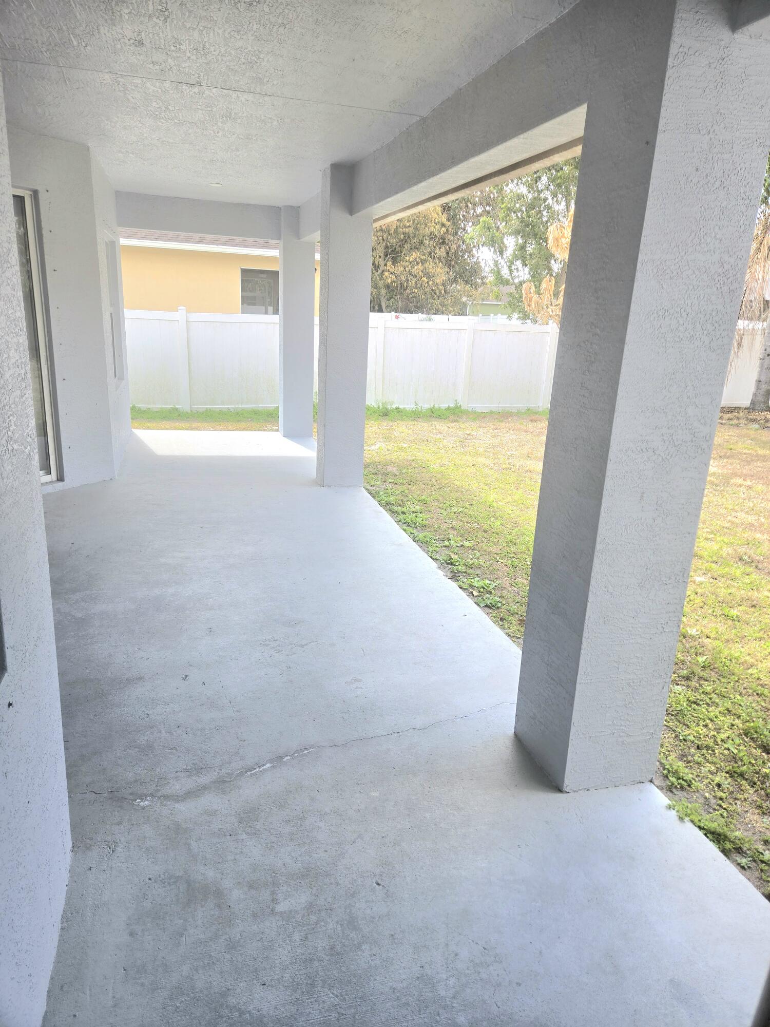 2472 Southwest Valnera Street Port St. Lucie, FL 34953 - Photo 26 of 30 a view of an empty room with a window