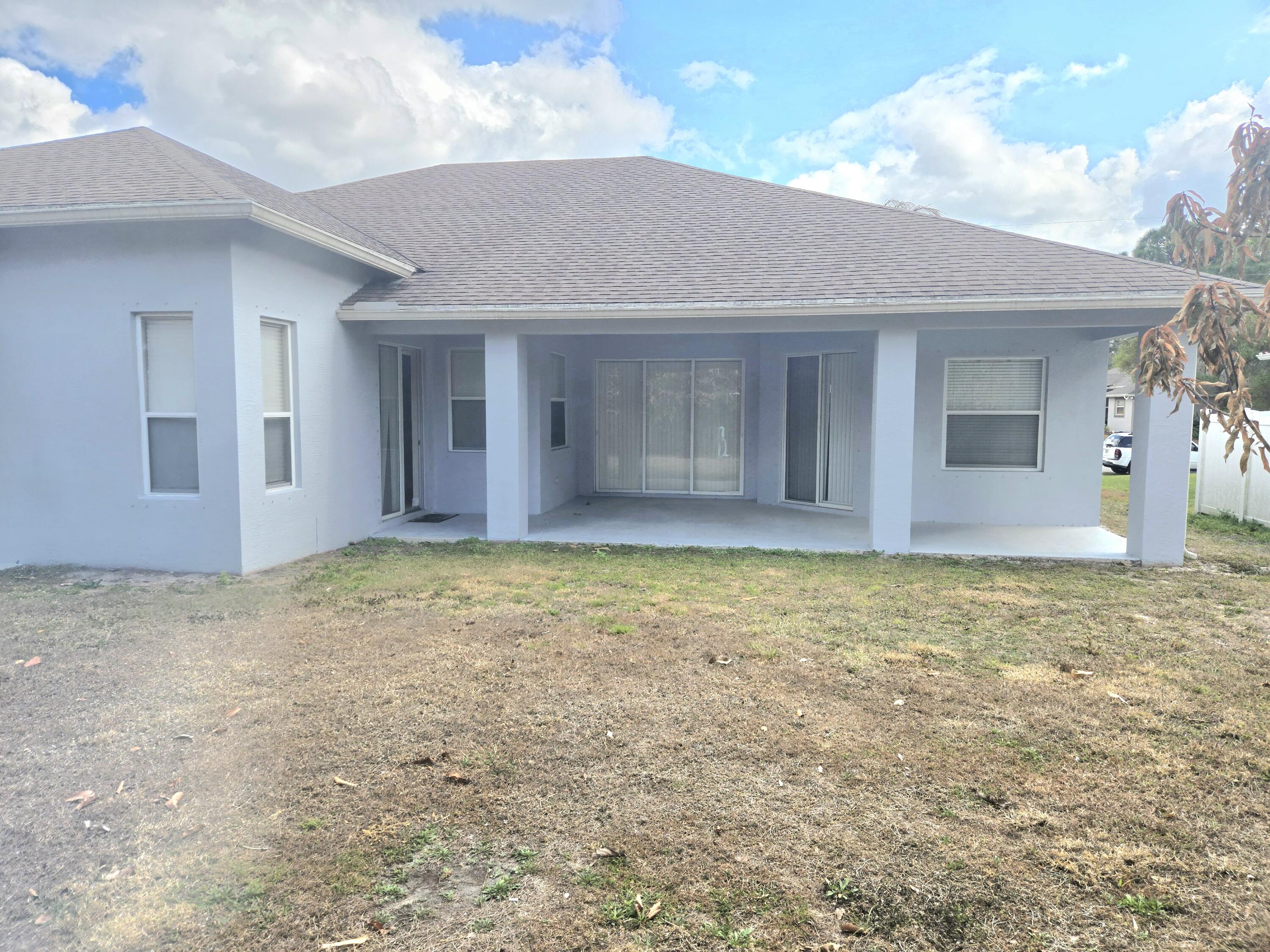 2472 Southwest Valnera Street Port St. Lucie, FL 34953 - Photo 30 of 30 a view of an empty room with window