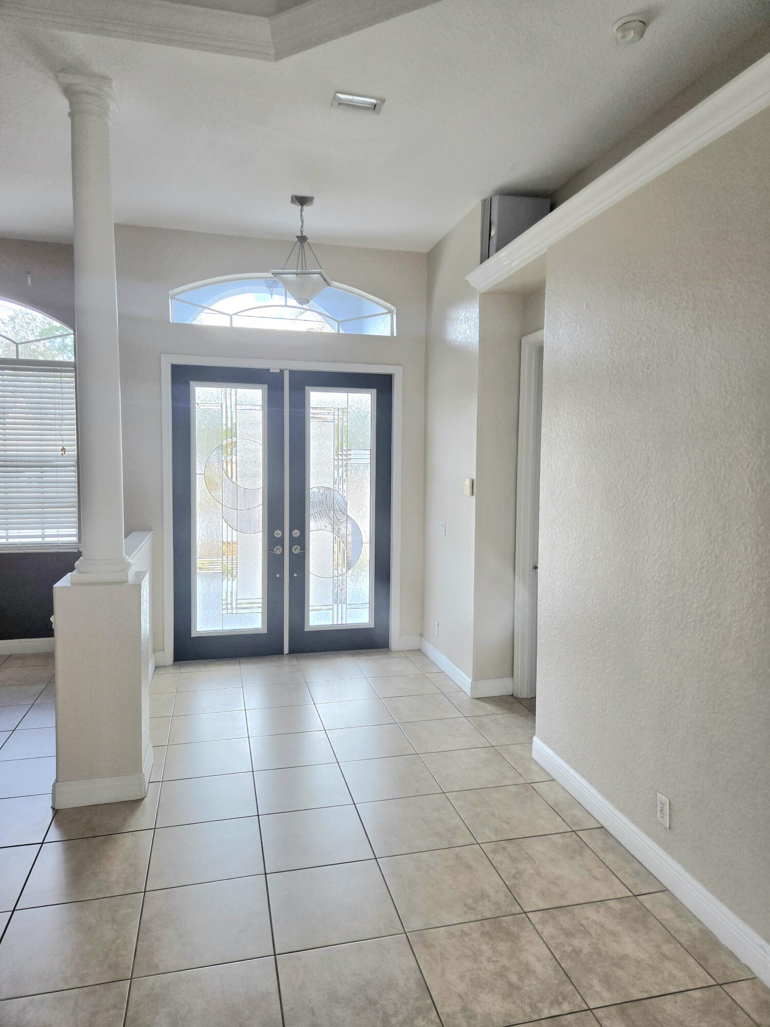 2472 Southwest Valnera Street Port St. Lucie, FL 34953 - Photo 6 of 30 a view of an empty room with a window