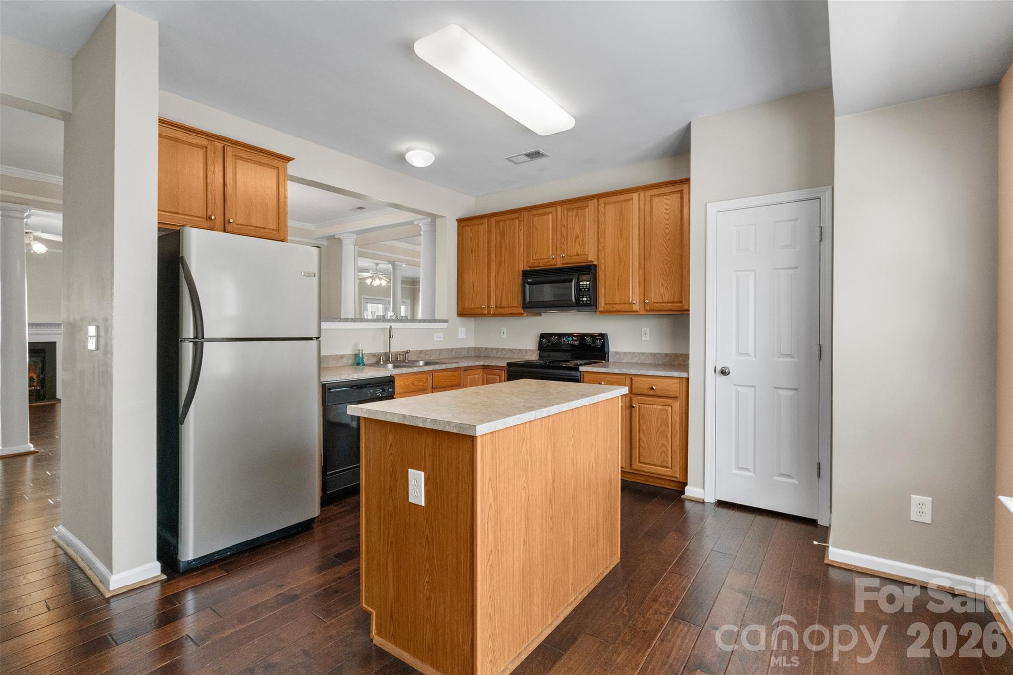 104 Rock Ridge Lane Mount Holly, NC 28120 - Photo 19 of 48 a kitchen with stainless steel appliances granite countertop a refrigerator a stove a sink and a microwave