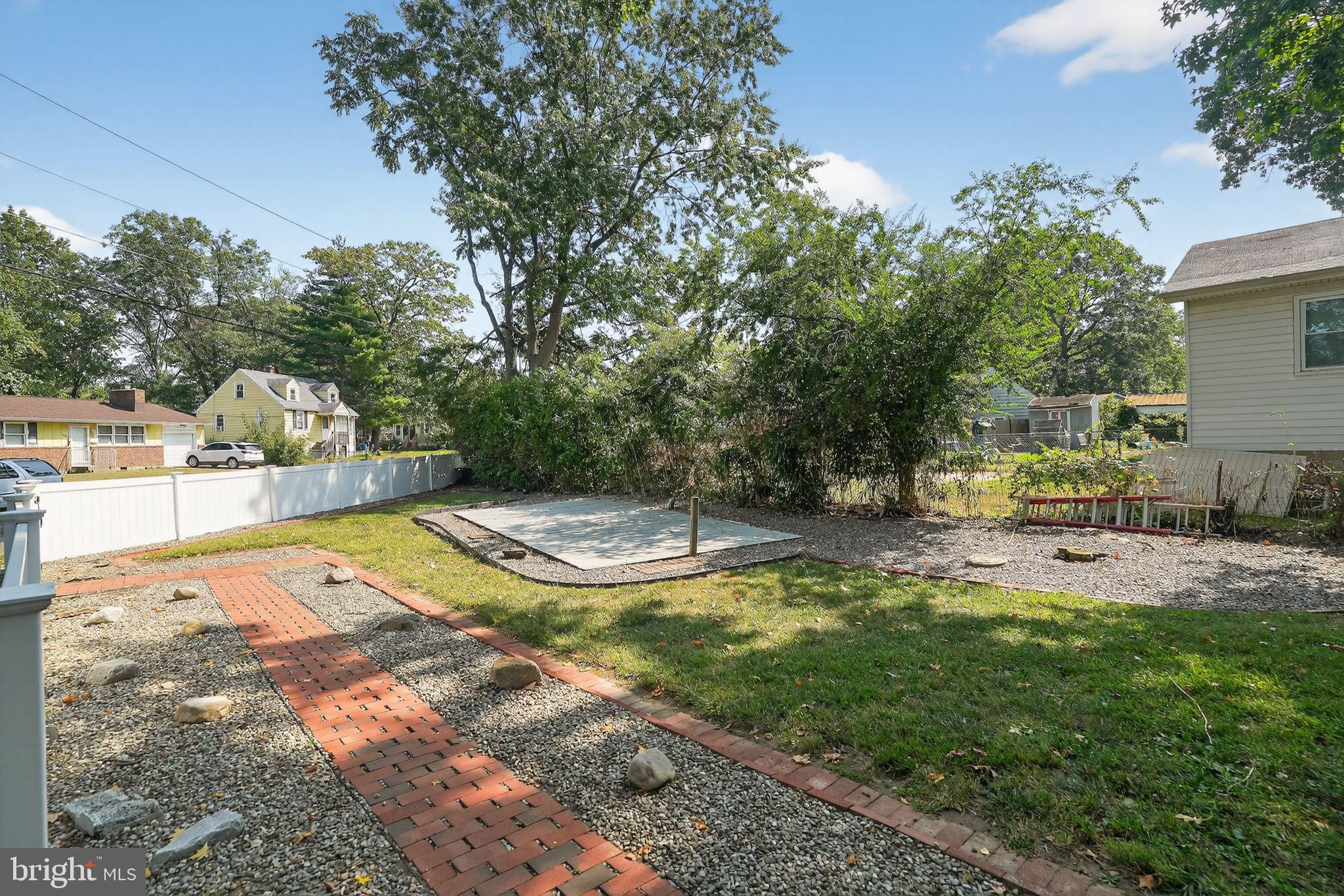 107 South Forklanding Road Maple Shade, NJ 08052 - Photo 5 of 36 a view of a swimming pool with a patio