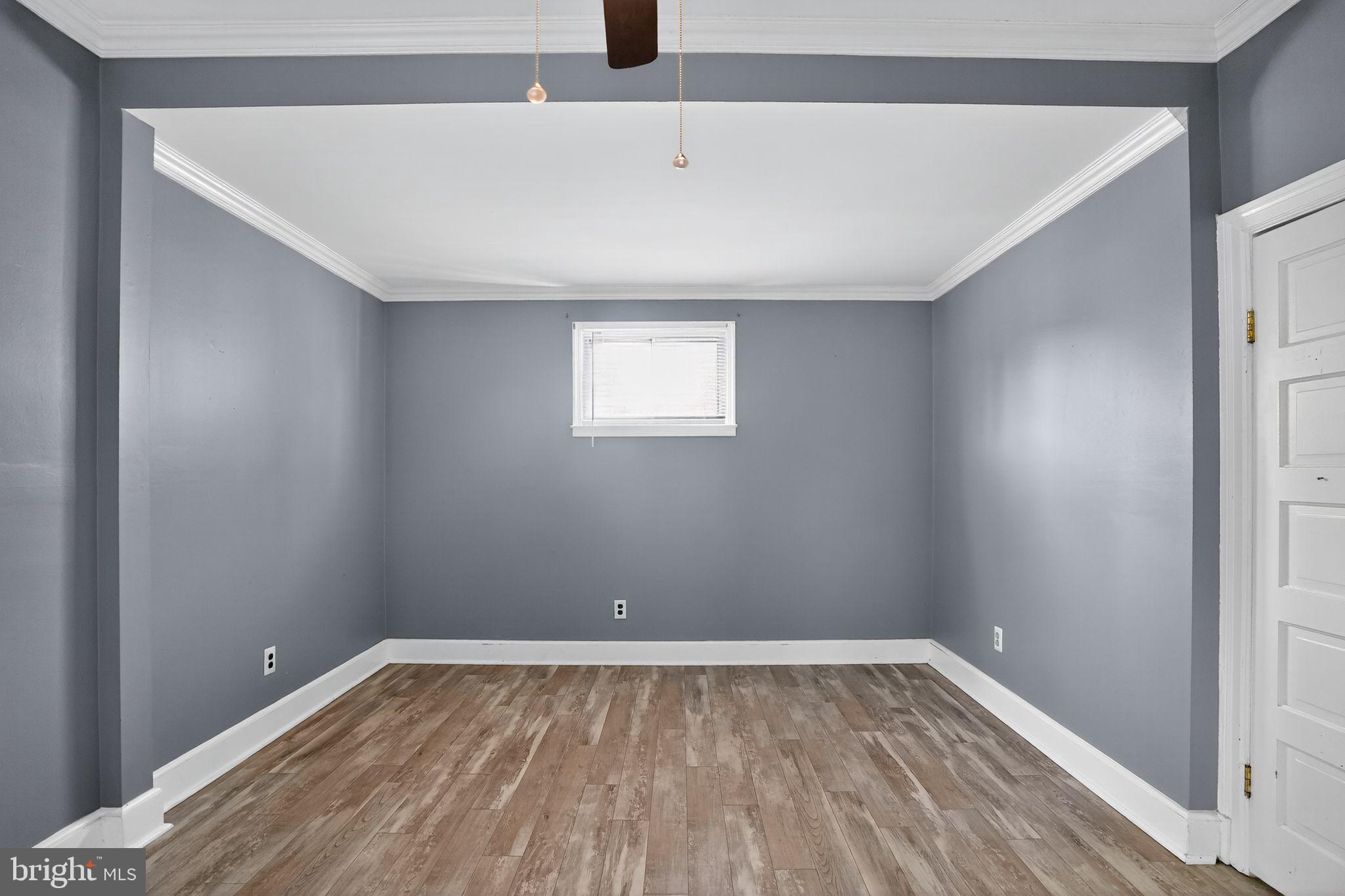 107 South Forklanding Road Maple Shade, NJ 08052 - Photo 10 of 36 a view of a room with wooden floor and window