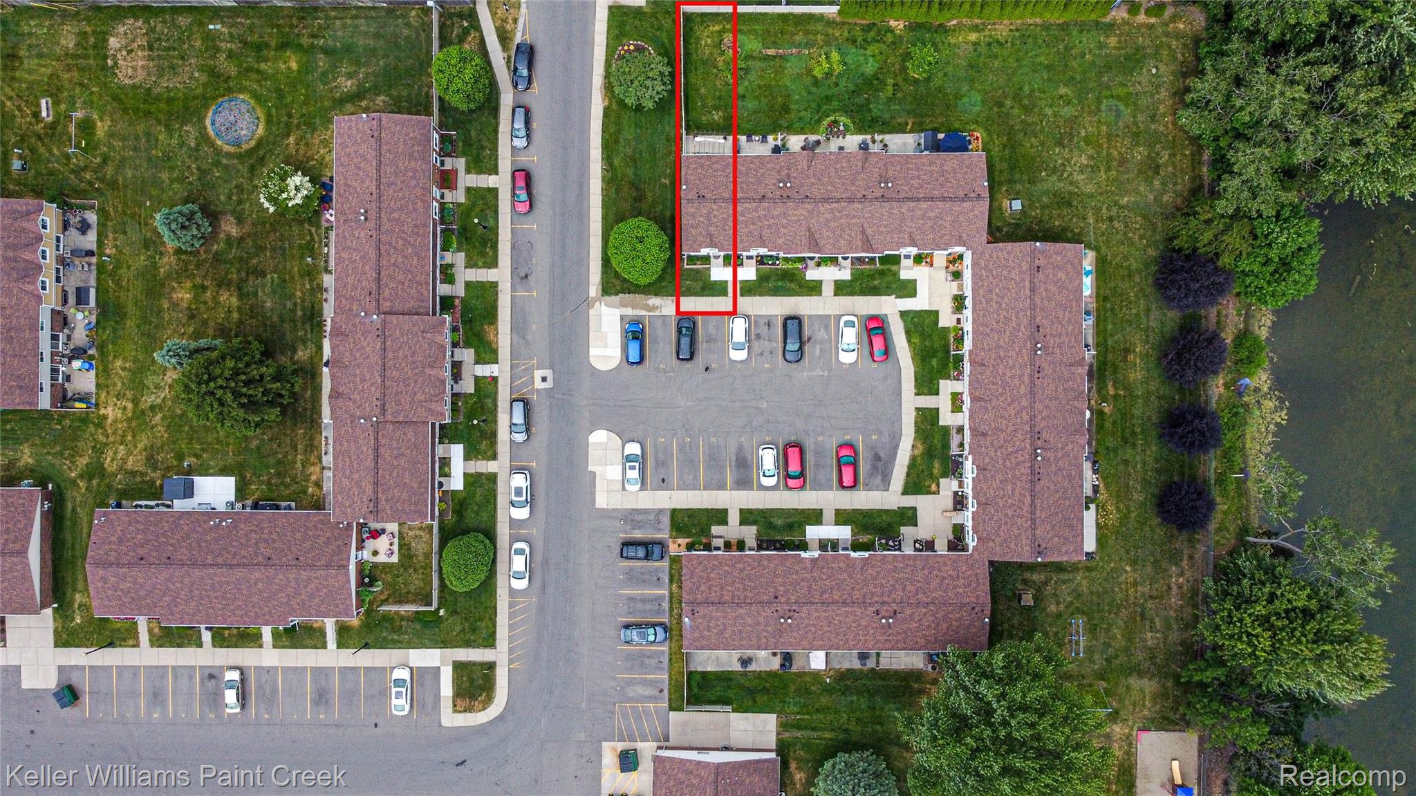 11401 Messmore Road Utica, MI 48317 - Photo 35 of 43 Aerial perspective showcasing a residential community with multiple buildings and a paved parking area