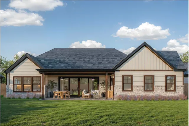 a front view of a house with a yard and porch