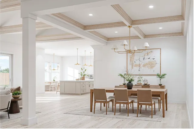 a dining room with wooden floor a chandelier a wooden table and chairs