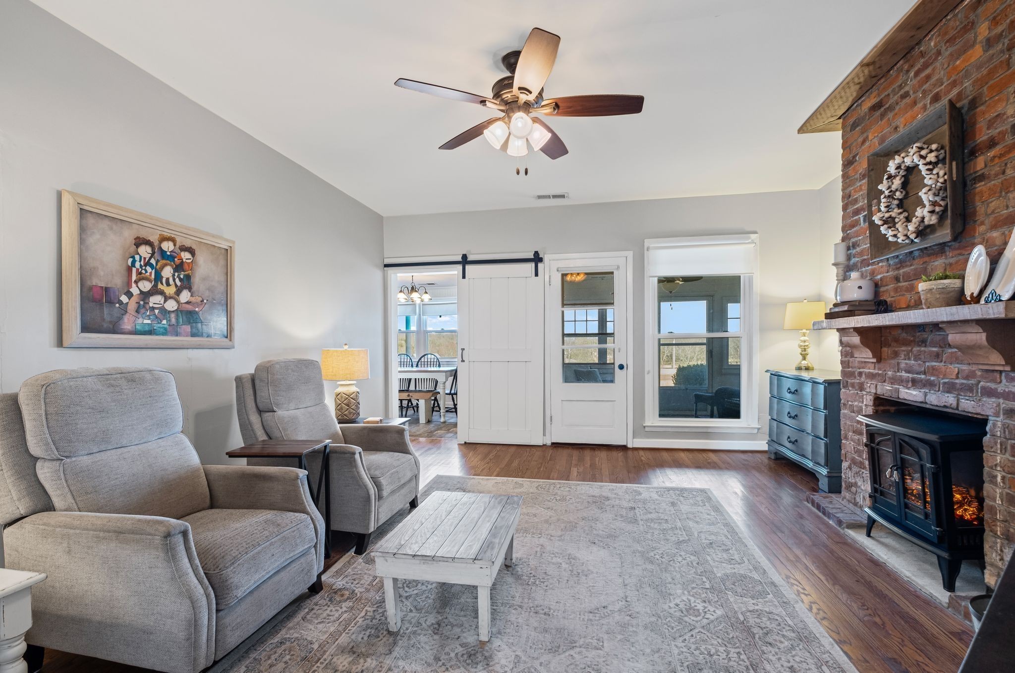 4125 Trinity Road Franklin, TN 37067 - Photo 22 of 44 a living room with furniture and a fireplace