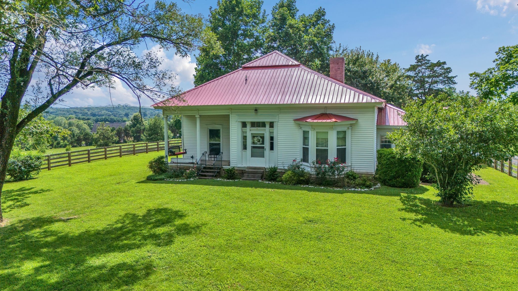 4125 Trinity Road Franklin, TN 37067 - Photo 9 of 44 a view of a house with a yard potted plants and large tree