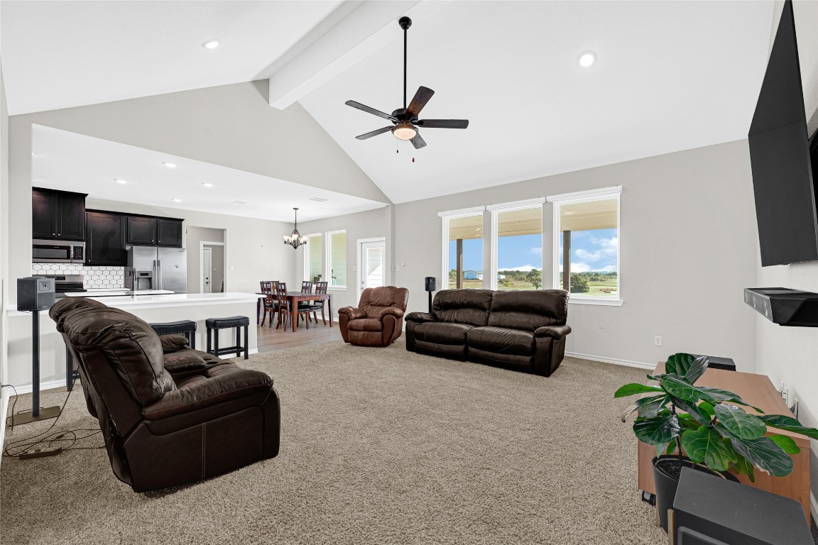 2256 West Bayshore Road Anahuac, TX 77514 - Photo 14 of 34 a living room with furniture and a flat screen tv