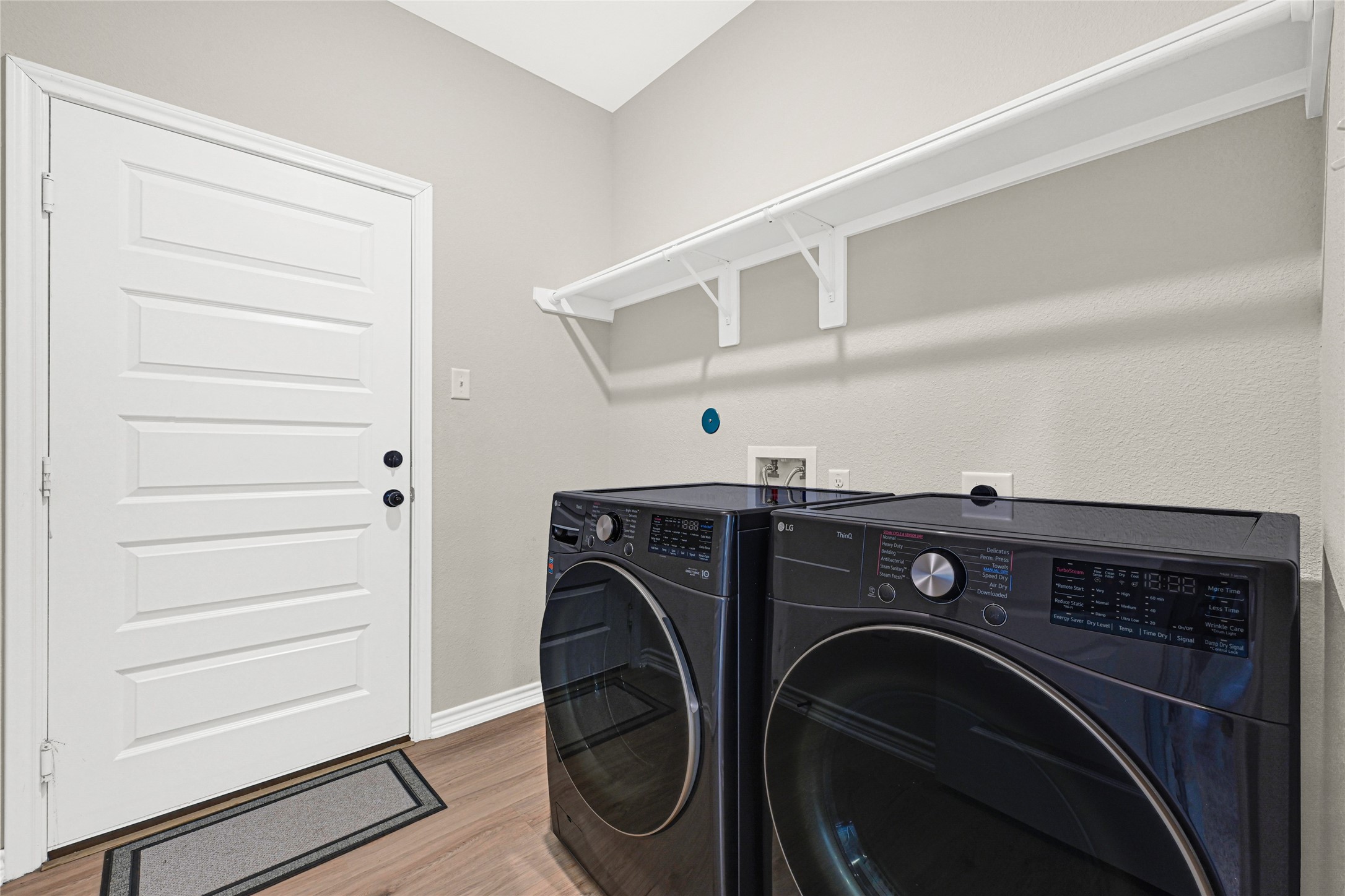 2256 West Bayshore Road Anahuac, TX 77514 - Photo 30 of 34 a utility room with dryer and washer
