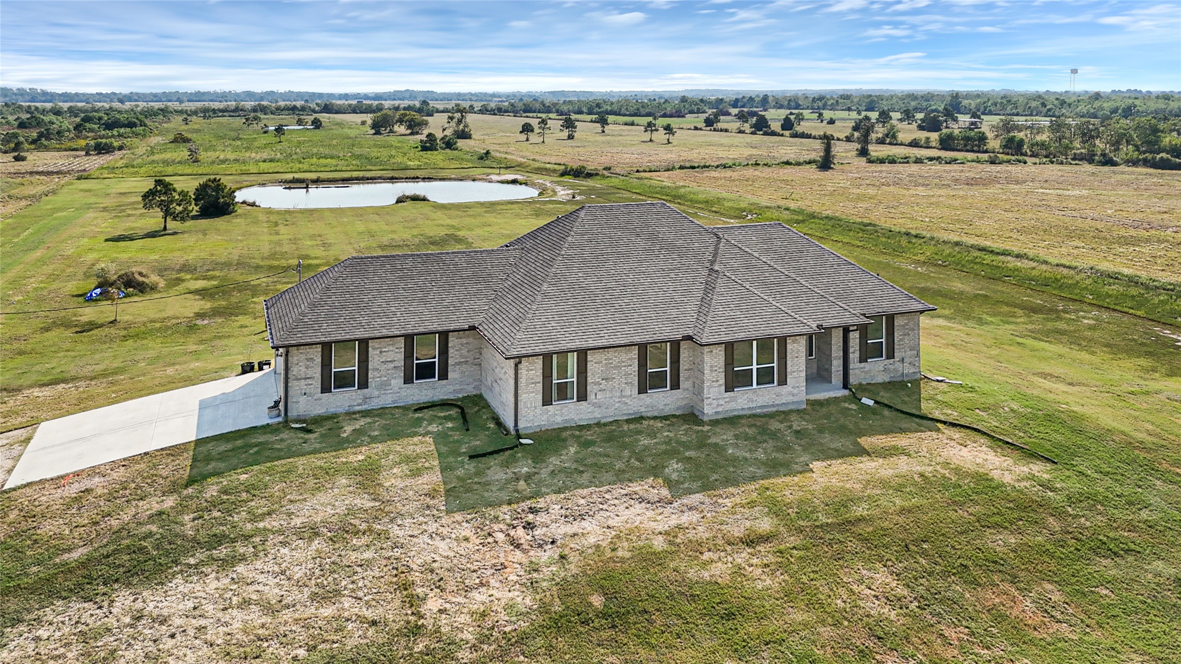 2256 West Bayshore Road Anahuac, TX 77514 - Photo 31 of 34 an aerial view of residential houses with outdoor space