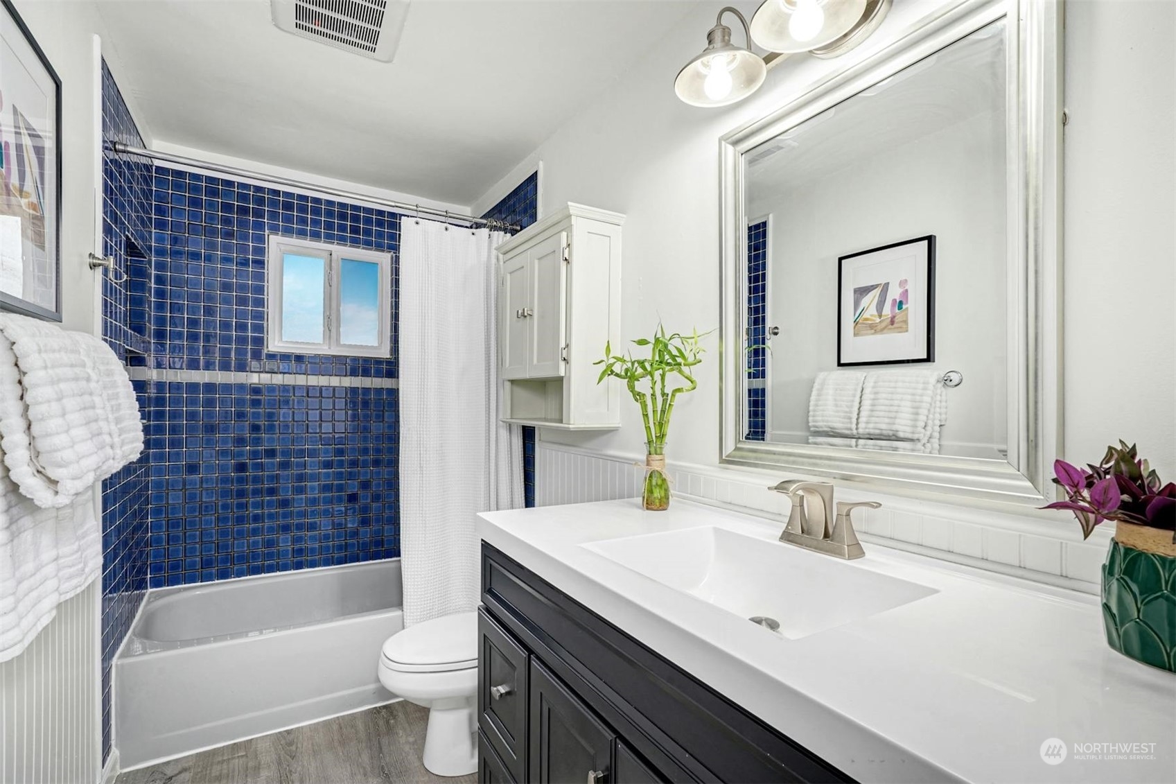 23223 Brier Road Brier, WA 98036 - Photo 14 of 30 a bathroom with a sink a toilet and shower