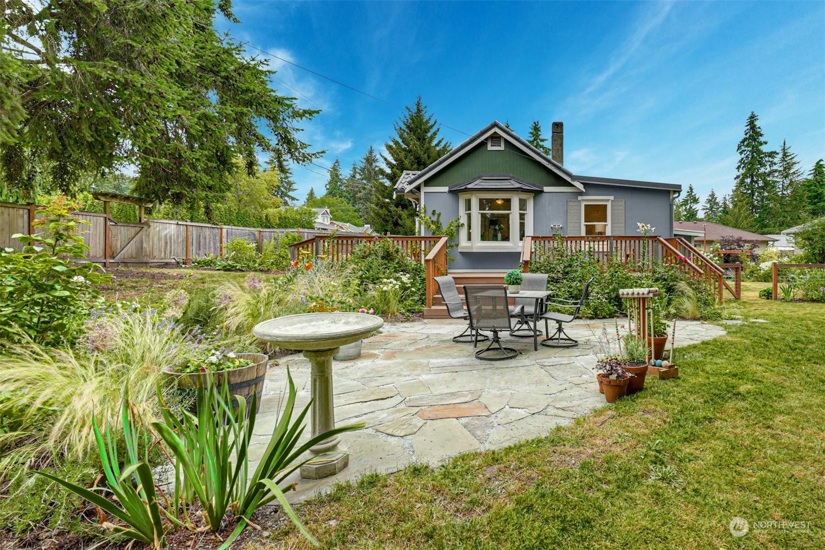 23223 Brier Road Brier, WA 98036 - Photo 25 of 30 a view of a house with backyard and sitting area