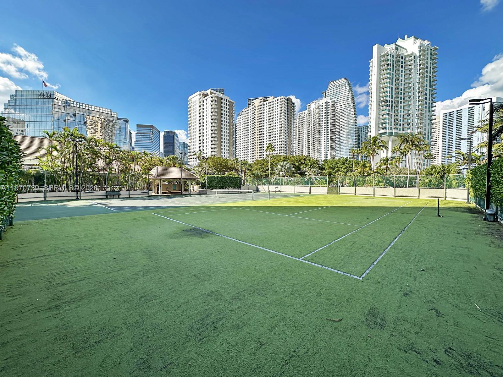 520 Brickell Key Drive, Unit A1912 Miami, FL 33131 - Photo 25 of 28 a view of a city with tall buildings and a big yard