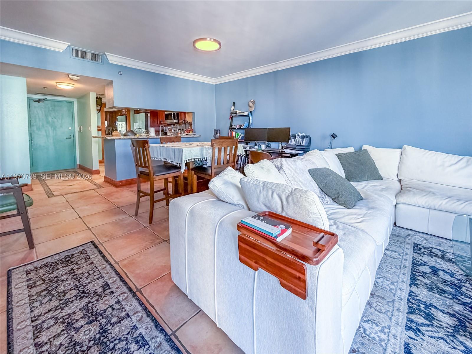 520 Brickell Key Drive, Unit A1912 Miami, FL 33131 - Photo 3 of 28 a room with furniture and a rug