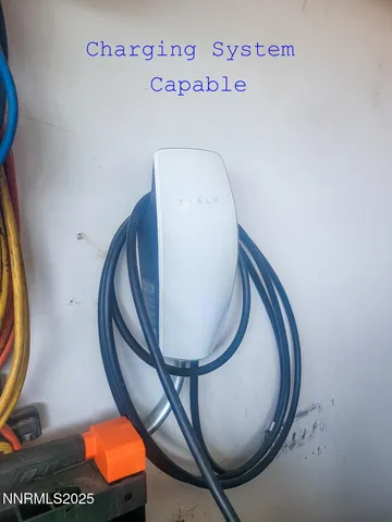 a view of staircase with washer and dryer