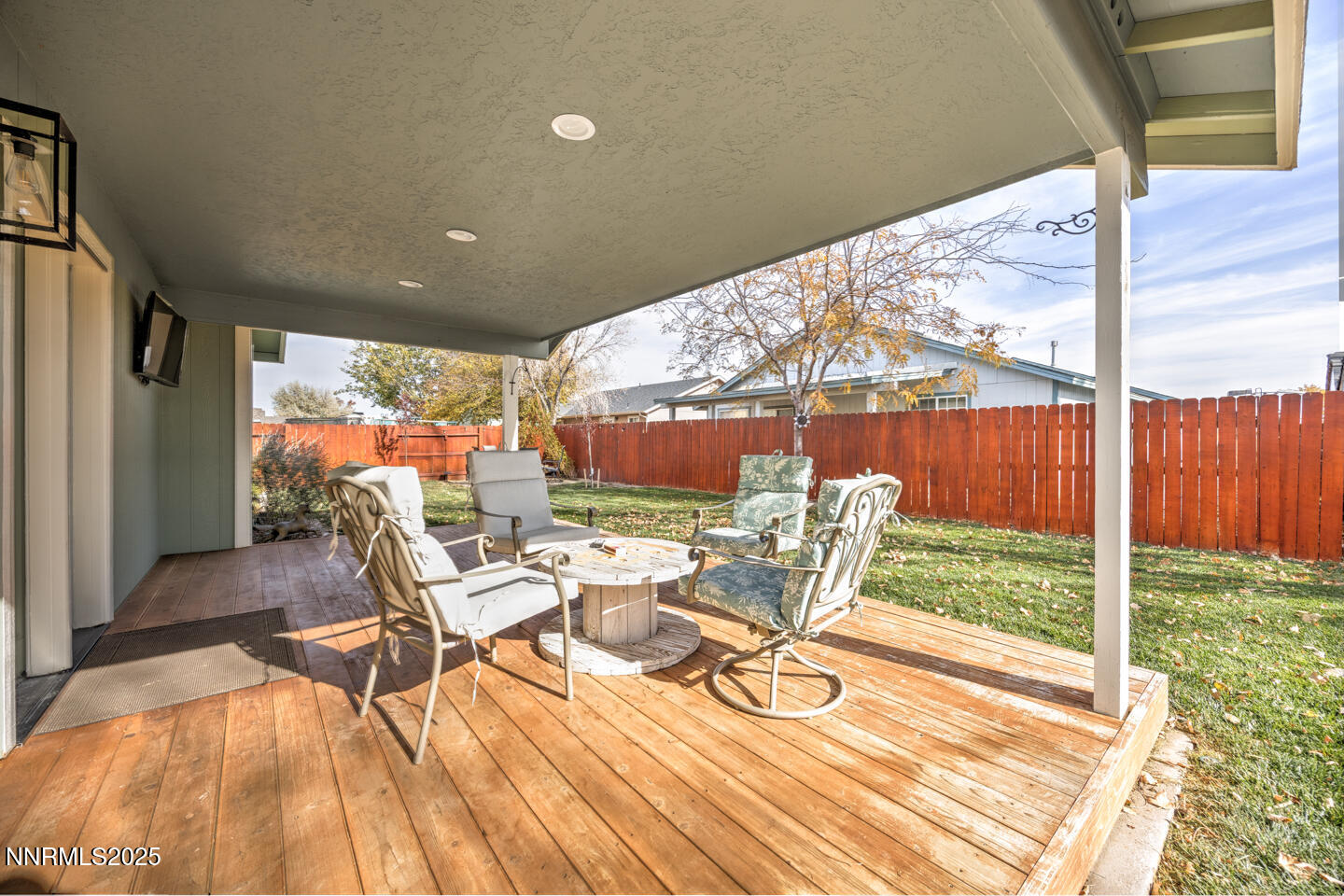 738 Noel Lane Fallon, NV 89406 - Photo 24 of 31 a outdoor space with chairs a couch and wooden floor