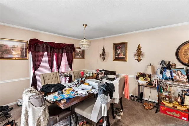 a view of a workspace with furniture and toys