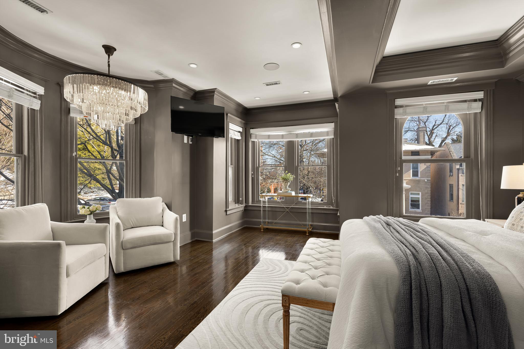 2200 Decatur Place Northwest Washington, DC 20008 - Photo 12 of 23 a spacious bedroom with a bed a couch and large window
