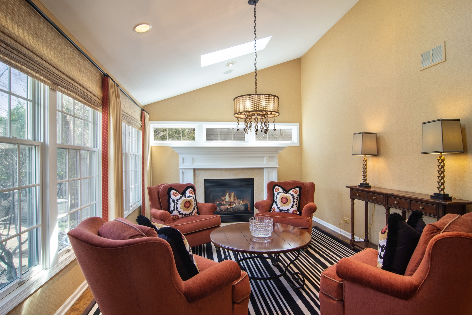 2540 Shannon Road Northbrook, IL 60062 - Photo 11 of 32 a living room with furniture a fireplace and a large window