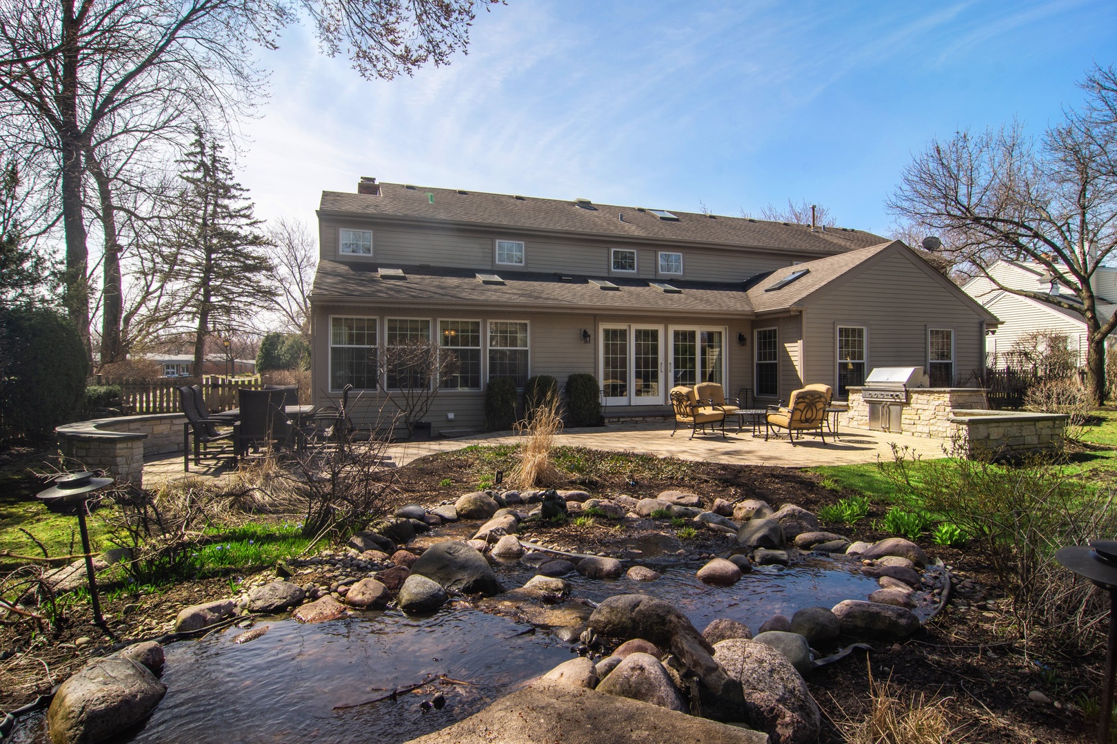 2540 Shannon Road Northbrook, IL 60062 - Photo 29 of 32 a front view of a house with swimming pool and patio