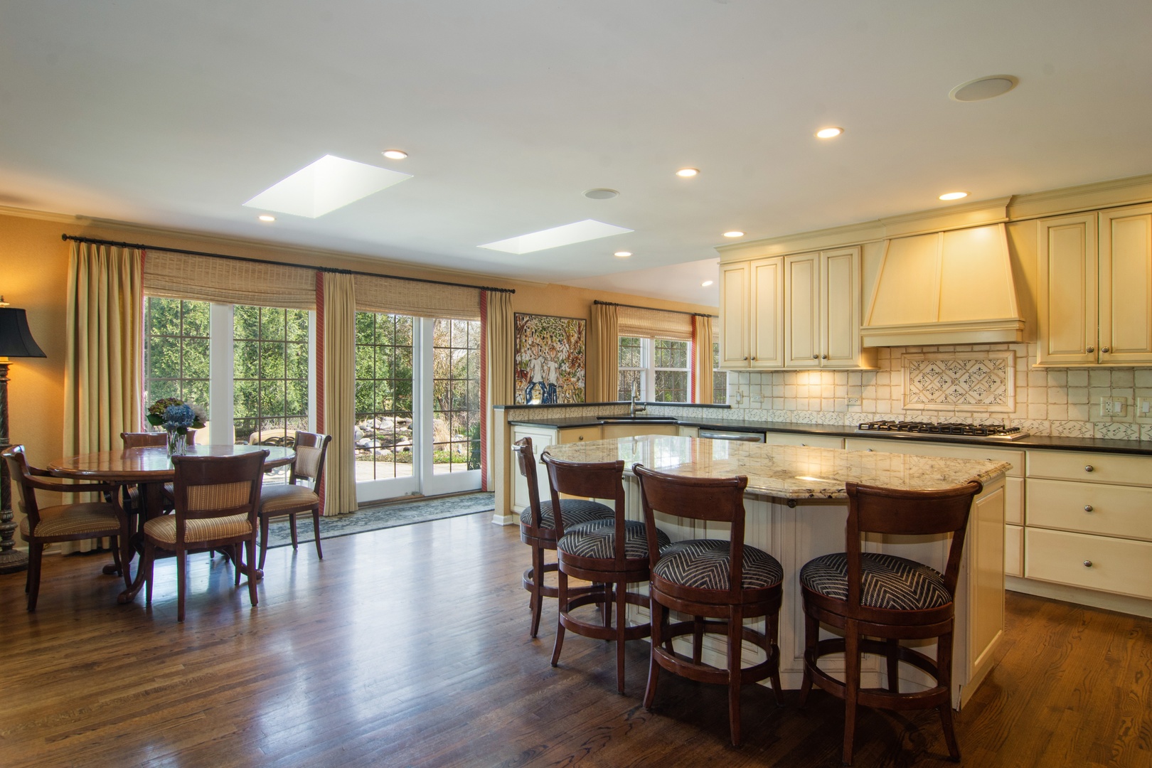 2540 Shannon Road Northbrook, IL 60062 - Photo 8 of 32 a dining room with furniture window and wooden floor