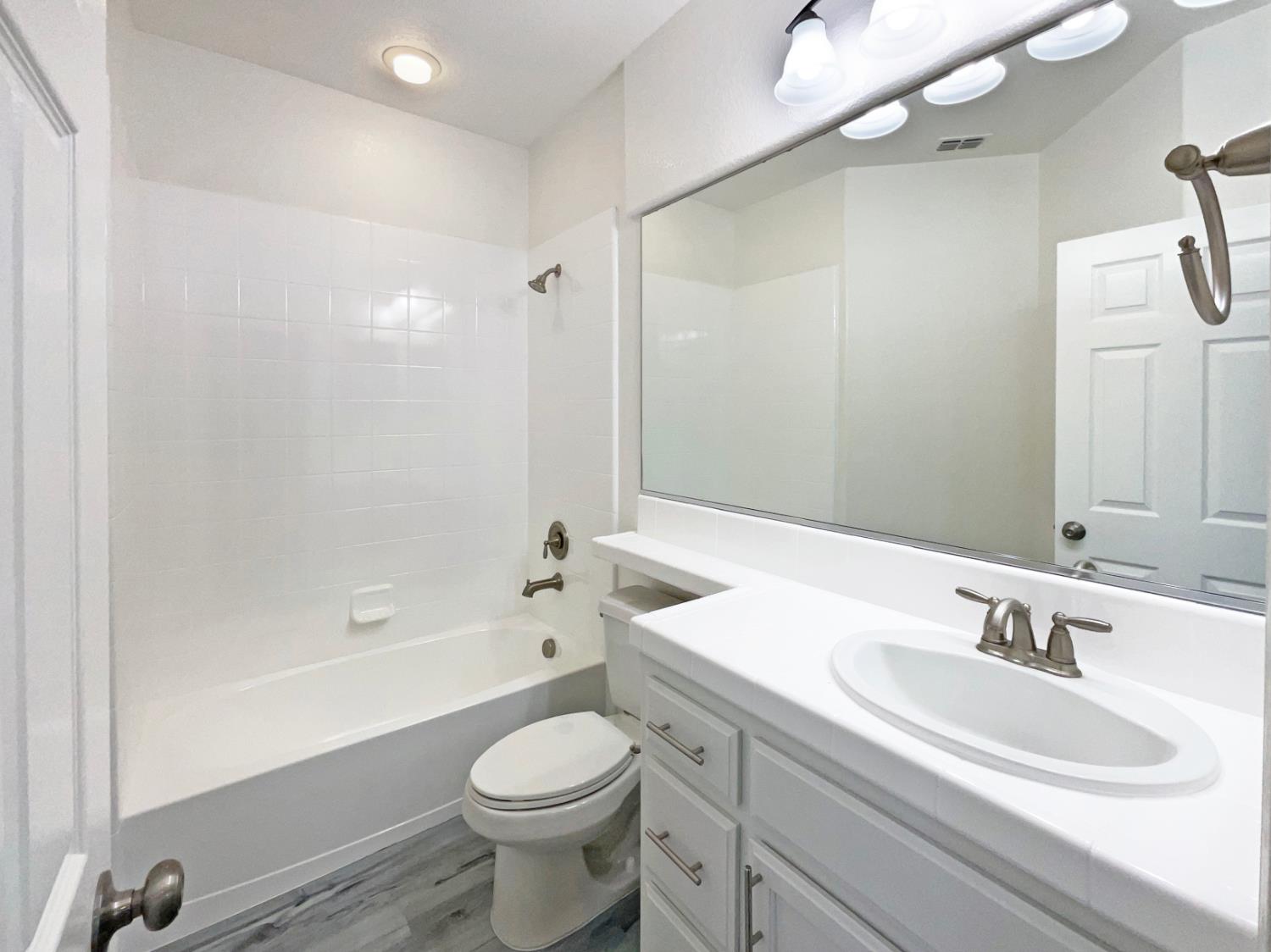 4087 Preserve Way Rancho Cordova, CA 95742 - Photo 15 of 24 a bathroom with a sink a toilet and shower