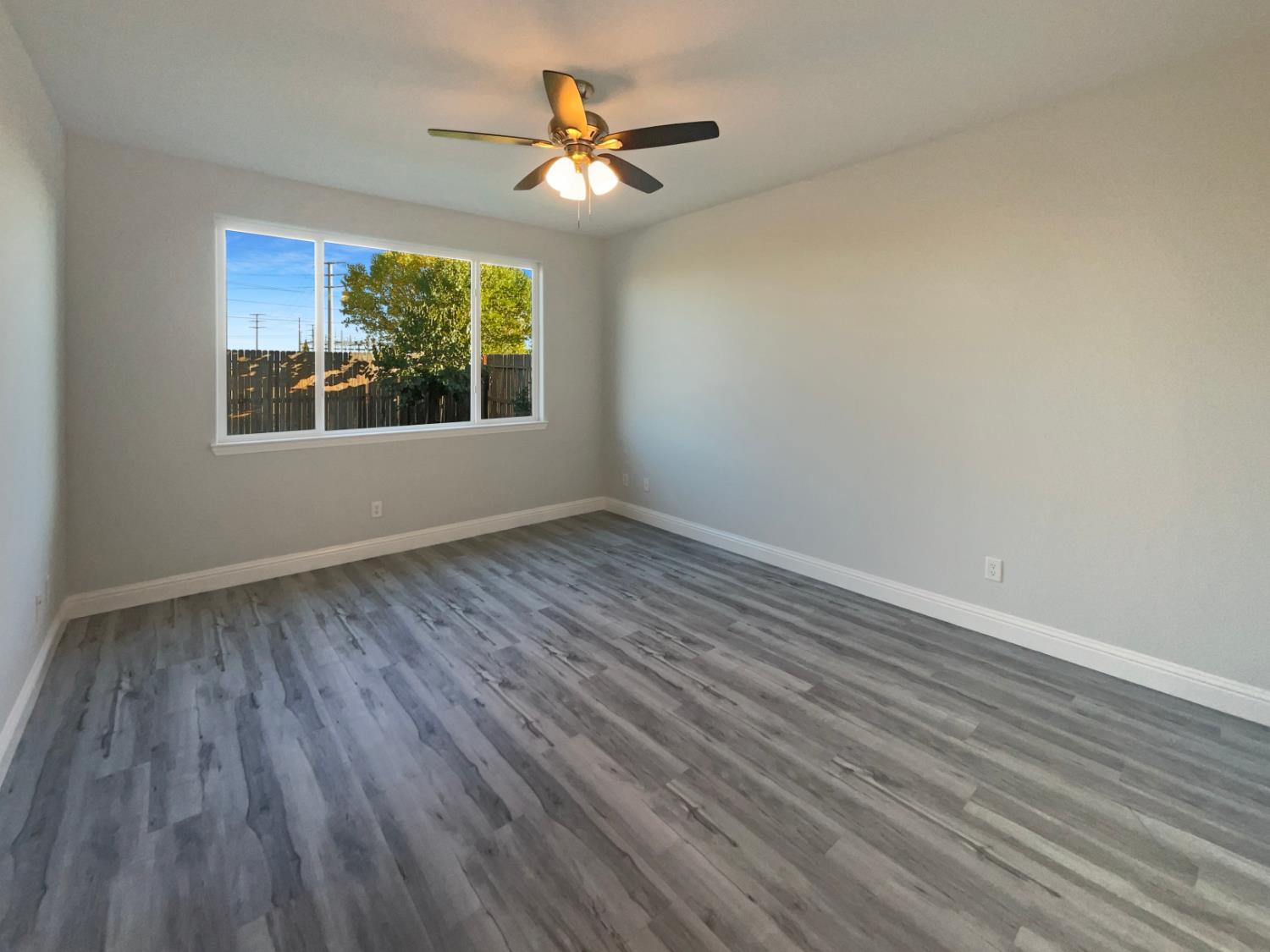 4087 Preserve Way Rancho Cordova, CA 95742 - Photo 5 of 24 wooden floor in an empty room with a window