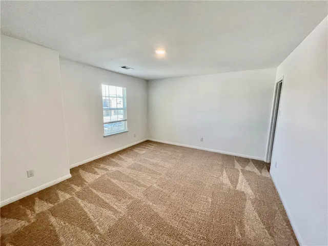 a view of empty room with window